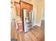 Modern kitchen with stainless steel refrigerator and wooden cabinets at 759 Hennepin Ter, Mcdonough, GA 30253