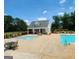 A community pool with a pool house and seating area for residents to enjoy during the summer months at 759 Hennepin Ter, Mcdonough, GA 30253