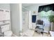 Accessible bathroom with walk-in shower, safety grab bars, and updated fixtures at 1130 Rawlings Dr, Rutledge, GA 30663
