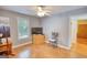 Bedroom featuring wood floors, ceiling fan, large dresser and closet at 1130 Rawlings Dr, Rutledge, GA 30663
