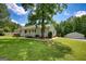 Charming home with manicured lawn, detached garage and tasteful landscaping on a desirable lot at 1130 Rawlings Dr, Rutledge, GA 30663