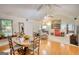 Bright and airy living space features hardwood floors, neutral colors, and lots of natural light at 1130 Rawlings Dr, Rutledge, GA 30663