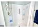 Walk-in shower is accessible and features safety grab bars, shower caddy, and handheld shower head at 1130 Rawlings Dr, Rutledge, GA 30663