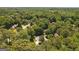 An aerial view of a neighborhood with mature trees, lush landscaping and well-maintained homes at 1850 Linnet Ne Ct, Roswell, GA 30075