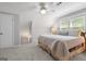 Bedroom featuring a ceiling fan, dormer windows, and sloped ceilings at 1850 Linnet Ne Ct, Roswell, GA 30075