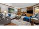 Inviting living room featuring a fireplace, wood trim, and stylish decor at 1850 Linnet Ne Ct, Roswell, GA 30075