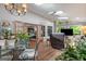Living room with hardwood floors, skylights, and french doors at 1850 Linnet Ne Ct, Roswell, GA 30075