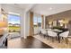 Open dining room with hardwood floors, neutral decor, and an inviting atmosphere at 173 Aster Ave, Locust Grove, GA 30248