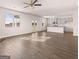 Spacious living room and kitchen, open floor plan and hard wood floors at 173 Aster Ave, Locust Grove, GA 30248