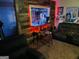 Finished basement features a bar area, seating, and a red accent lighting at 5814 Highgrove Dr, Atlanta, GA 30349