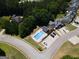 Community pool area with lounge chairs and ample parking spots at 832 Windy Mill Ct, Temple, GA 30179