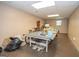 Spacious basement area with ping pong table, perfect for recreation and entertainment at 832 Windy Mill Ct, Temple, GA 30179