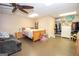 Finished basement bedroom with en-suite closet and natural wooden bed frame at 832 Windy Mill Ct, Temple, GA 30179