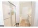 Bathroom featuring a glass-enclosed shower and tile floors, combining functionality and a clean aesthetic at 832 Windy Mill Ct, Temple, GA 30179