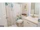 Functional bathroom with a floral shower curtain, providing privacy and a touch of style at 832 Windy Mill Ct, Temple, GA 30179