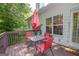 Cozy deck with outdoor dining set and pleasant views, perfect for relaxation at 832 Windy Mill Ct, Temple, GA 30179