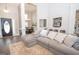 Open-concept living space featuring hardwood floors and direct sight lines to the entry at 832 Windy Mill Ct, Temple, GA 30179