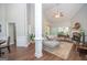 Bright living room with vaulted ceilings, fireplace, and seamless access to the outdoors at 832 Windy Mill Ct, Temple, GA 30179