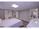 Cozy basement bedroom featuring natural light, an office area, and neutral paint color at 8321 Banks Mill Rd, Douglasville, GA 30135