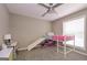 Bedroom with ceiling fan, window and playful decor at 8321 Banks Mill Rd, Douglasville, GA 30135
