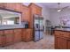 Kitchen featuring stainless steel refrigerator and eat-in dining area at 8321 Banks Mill Rd, Douglasville, GA 30135