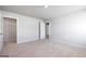 Well-lit bedroom with neutral carpet, closet and serene atmosphere offering a comfortable living space at 609 Lobelia Way, Locust Grove, GA 30248
