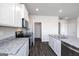 A kitchen featuring granite countertops, stainless steel appliances, and an open pantry at 609 Lobelia Way, Locust Grove, GA 30248