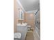 Bright bathroom featuring a white vanity, toilet, shower and tile floor at 120 Greenview Ter, Mcdonough, GA 30253