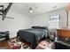 Clean bedroom featuring a ceiling fan, hardwood floors, natural light and closet space at 120 Greenview Ter, Mcdonough, GA 30253