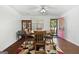 Cozy dining area with natural light, classic wood table and matching chairs at 120 Greenview Ter, Mcdonough, GA 30253