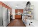 Functional kitchen featuring stainless steel refrigerator and ample pantry space at 120 Greenview Ter, Mcdonough, GA 30253