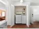 Bright laundry closet equipped with a modern washer and dryer at 120 Greenview Ter, Mcdonough, GA 30253