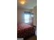 Comfortable bedroom with carpet, a bed, and chest of drawers, bathed in natural light at 7314 Basalt Dr, Union City, GA 30291