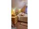 Bedroom featuring neutral colors, integrated bedside table, lamps, and an 