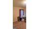 A carpeted bedroom with a window has a sewing machine and organizer for crafting or hobbies at 7314 Basalt Dr, Union City, GA 30291