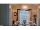 Elegant dining room with a crystal chandelier and large window at 7314 Basalt Dr, Union City, GA 30291