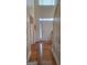 Bright foyer featuring hardwood floors, white trim, and a front door with sidelights at 7314 Basalt Dr, Union City, GA 30291