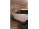 Spacious garage with a white car parked inside and a garage door opener at 7314 Basalt Dr, Union City, GA 30291