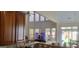 An open living space visible from the kitchen area with nice lighting and a TV at 7314 Basalt Dr, Union City, GA 30291