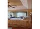 Spacious main bedroom featuring a ceiling fan and windows for natural lighting at 7314 Basalt Dr, Union City, GA 30291