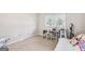Cozy bedroom with desk, window view, and comfortable furnishings in a home at 308 Lee Thompson Rd, Moreland, GA 30259