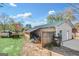 Exterior of garage and storage, providing ample space for tools and equipment in a country setting at 308 Lee Thompson Rd, Moreland, GA 30259
