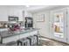 Updated kitchen featuring granite counters, breakfast bar seating, and sleek appliances at 308 Lee Thompson Rd, Moreland, GA 30259