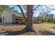 Outbuilding featuring an attached garage with storage and an adjacent deck with outdoor access at 308 Lee Thompson Rd, Moreland, GA 30259