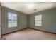 Bedroom with natural light and carpet flooring at 2809 South Ola Rd, Locust Grove, GA 30248