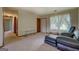 View of front living room showing plenty of space, natural light, and access to other rooms at 2809 South Ola Rd, Locust Grove, GA 30248