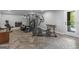 Basement with fitness equipment and an exterior door leading to the backyard at 2270 Emerald Dr, Jonesboro, GA 30236