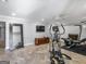 Basement with gym equipment, TV, and decor at 2270 Emerald Dr, Jonesboro, GA 30236