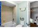 Updated bathroom with bathtub and classic fixtures at 2270 Emerald Dr, Jonesboro, GA 30236