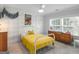 Well-lit bedroom with carpeted floors, light-colored walls, and ceiling fan at 2270 Emerald Dr, Jonesboro, GA 30236